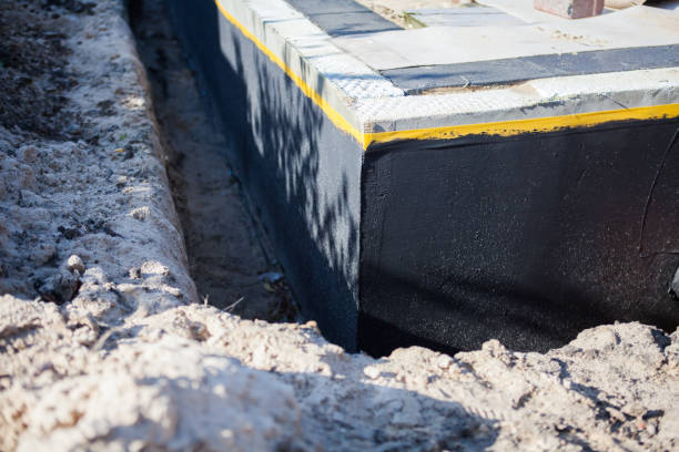 Professional Waterproofing technician working in Camden, MI